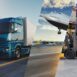 3D rendering depicting various global transportation methods, including trucking, air freight, warehouse logistics, and maritime shipping. A conceptual representation of worldwide trade and supply chain networks.
